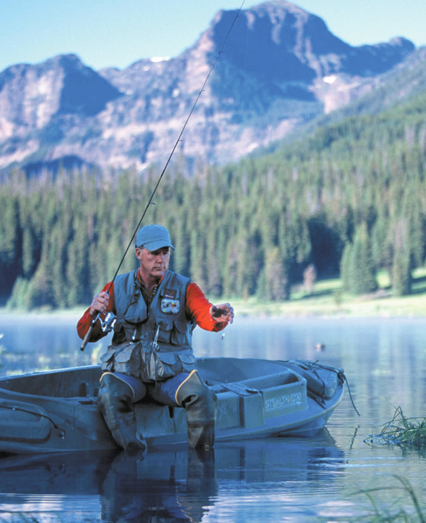 Beavertail Man Sitting on a Stealth 1200 Sneak Boat/Kayak Fishing