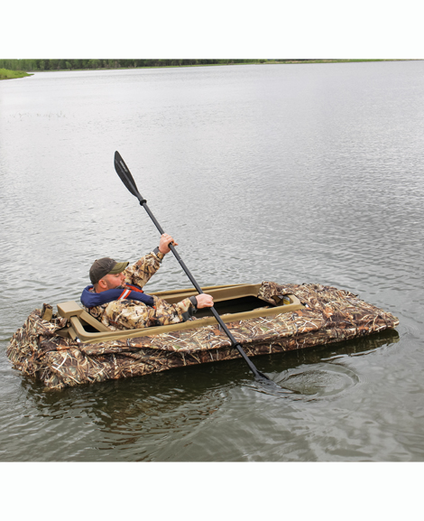 Beavertail Man Paddling in Final Attack Boat and Pit Blind Lifestyle