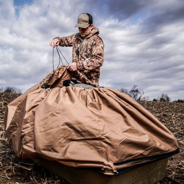 Beavertail Man Loading Geese Decoys in Medium Decoy Hauler Sled Package