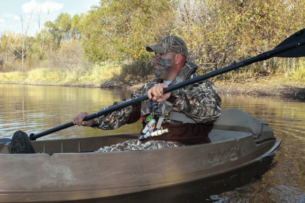 Beavertail Man Paddling in Phantom Sneak Boat/Kayak Lifestyle for Waterfall Duck Hunting