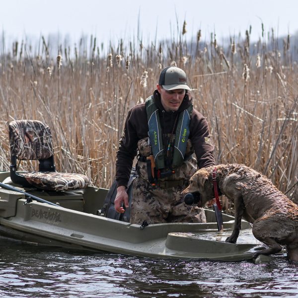 Beavertail Stealth Dog Entering a 2000 Sneak Boat/Kayak with Cushioned Swivel Seat