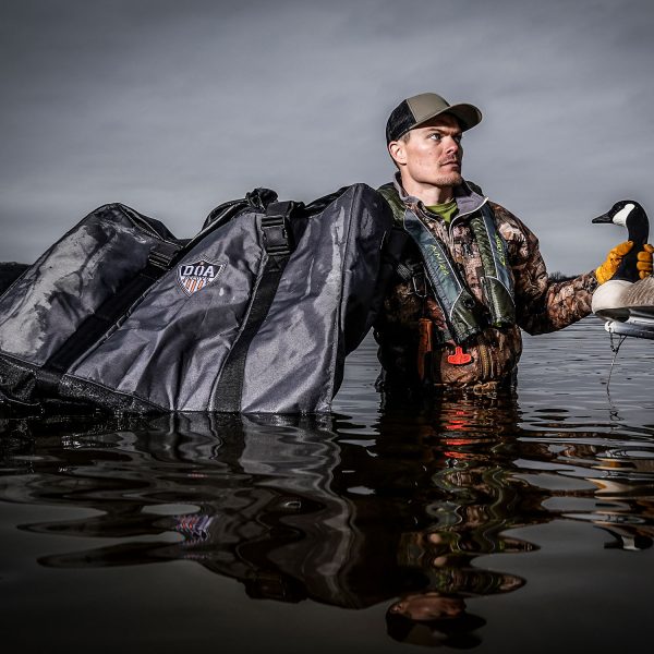 Beavertail Man in Water with Goose Decoy and 12 Slot Duck Floater Bag